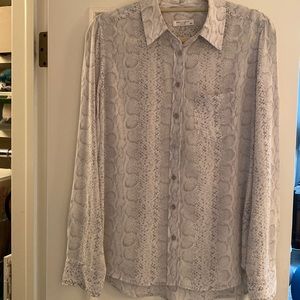 100% silk (low sheen) snake print. Soft gray and white blouse